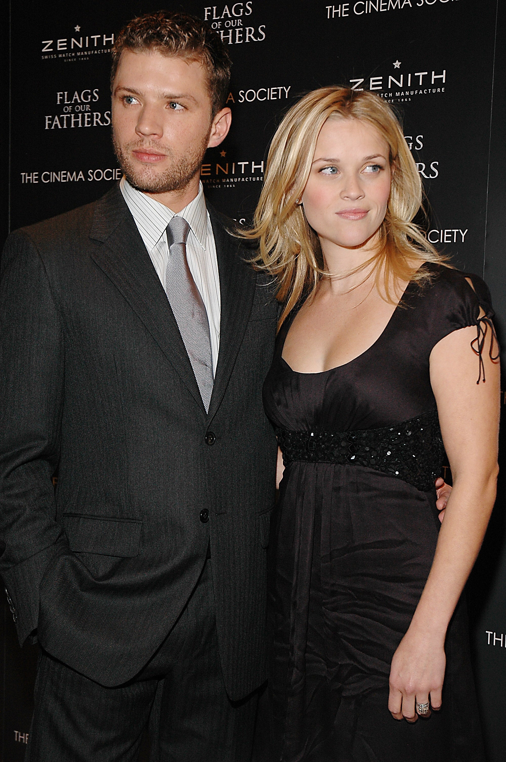 Reese and Ryan connected  a reddish  carpet