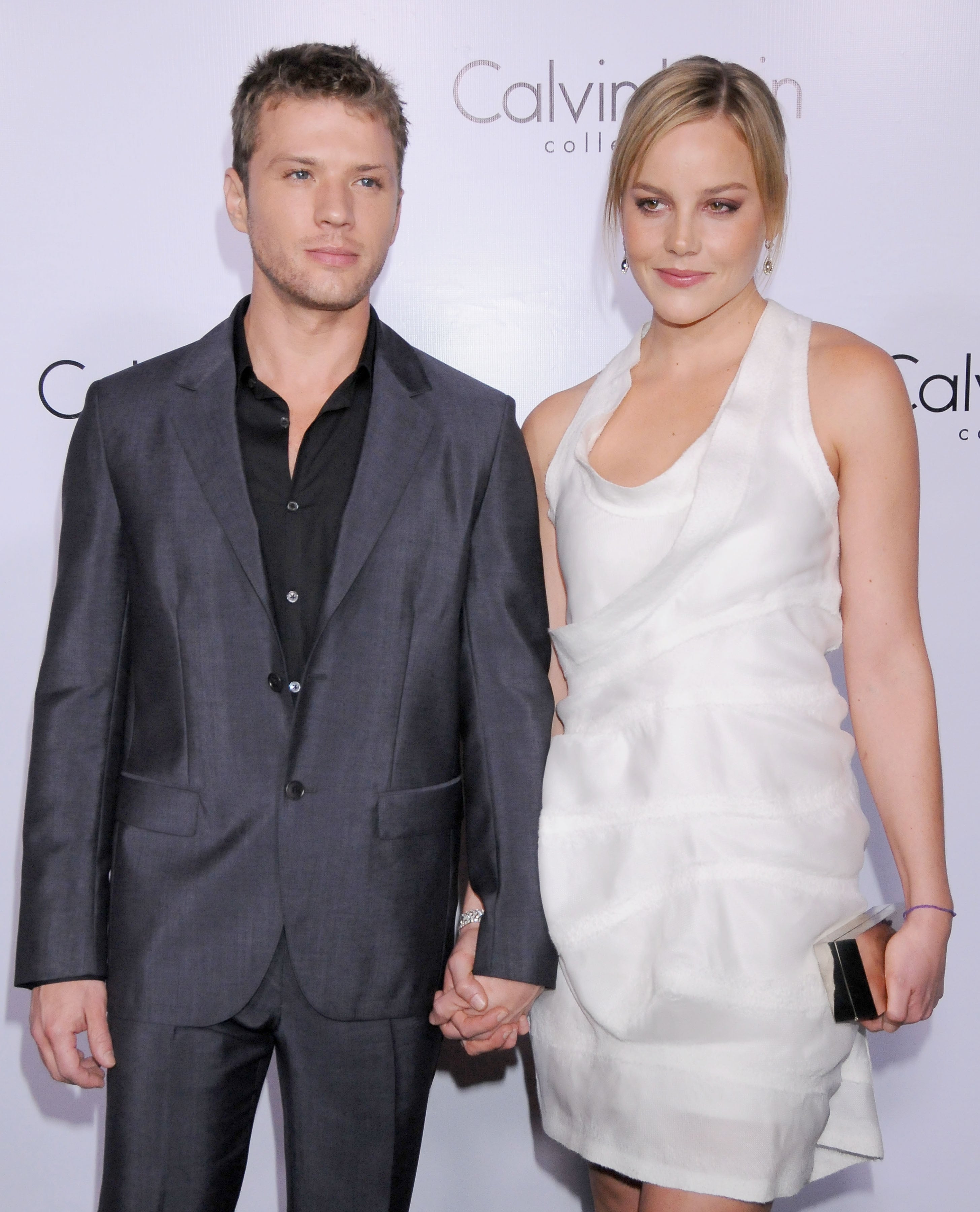 Ryan and Abbie airs  connected  the reddish  carpet