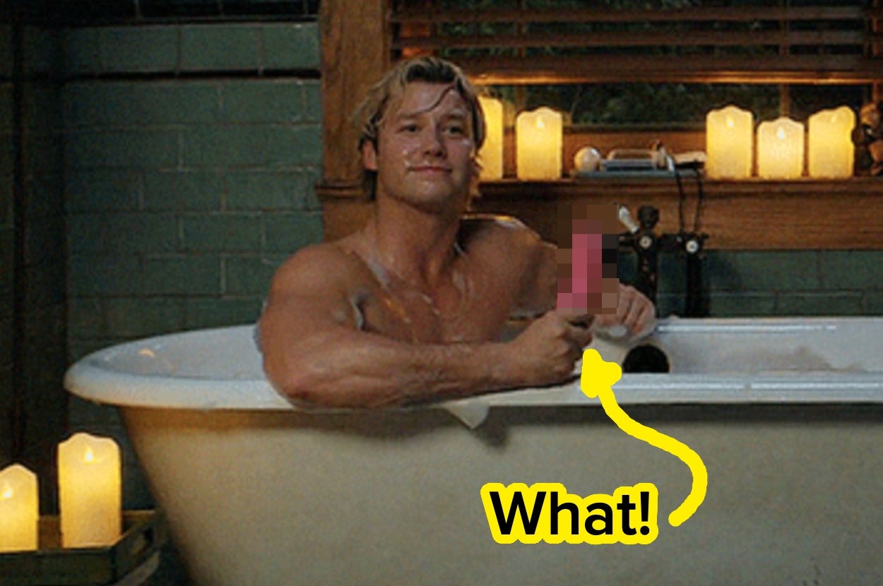 Person in a bathtub surrounded by candles, holding a phone. Text overlay says "What!" with an arrow pointing to the phone
