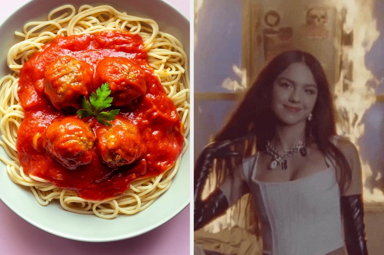 Plate of spaghetti and meatballs next to a person in a corset and gloves standing in front of flames