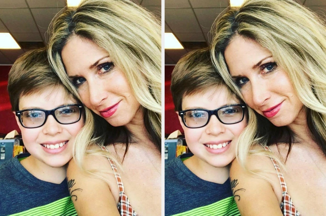 A woman and child with glasses smiling closely together, showcasing a warm and affectionate moment