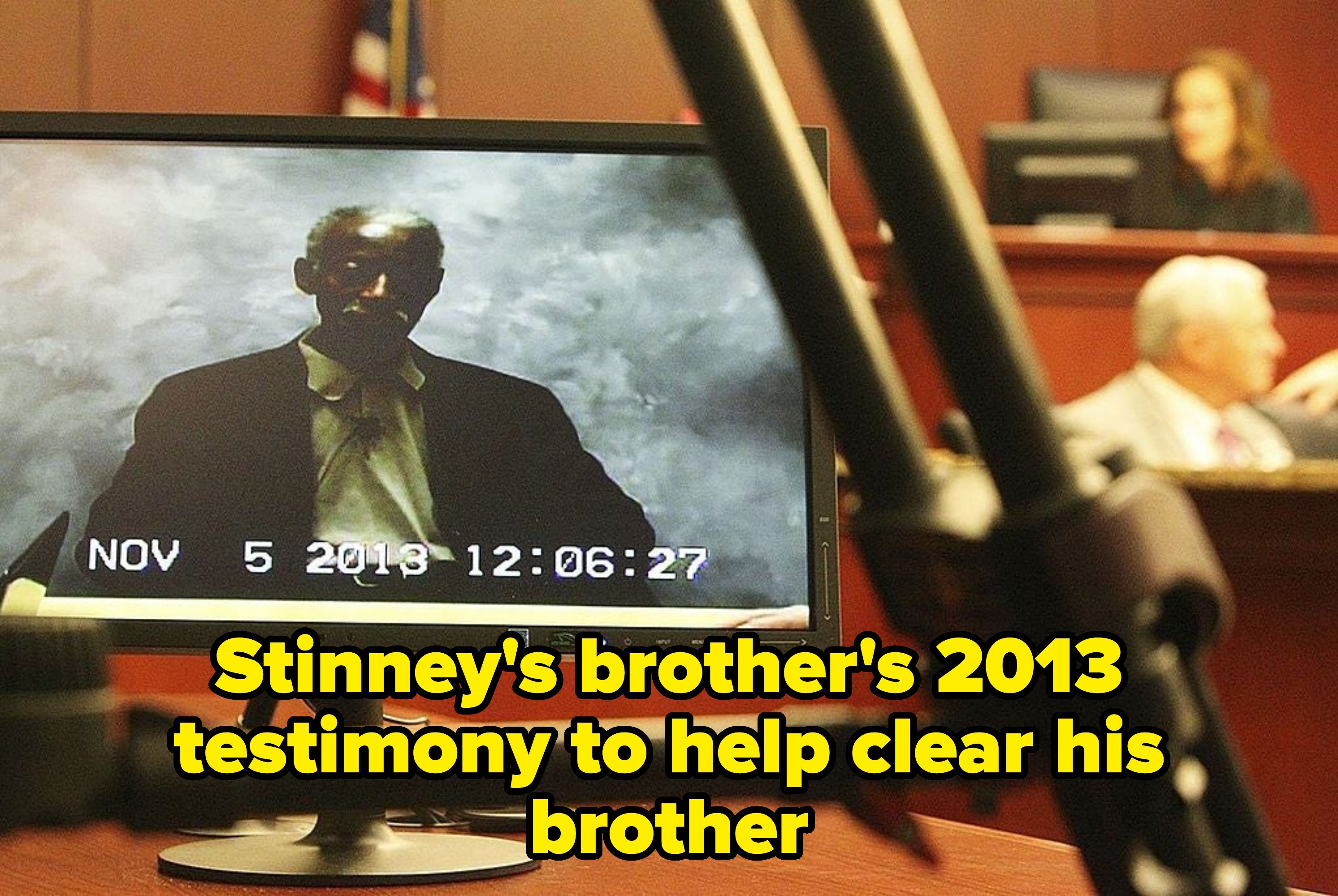 A courtroom country   with a video show   displaying a idiosyncratic   being recorded. A justice  is seen successful  the background