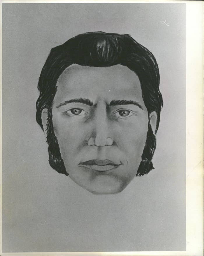 A monochrome, sketch-like drawing of a man's face with sideburns and medium-length hair