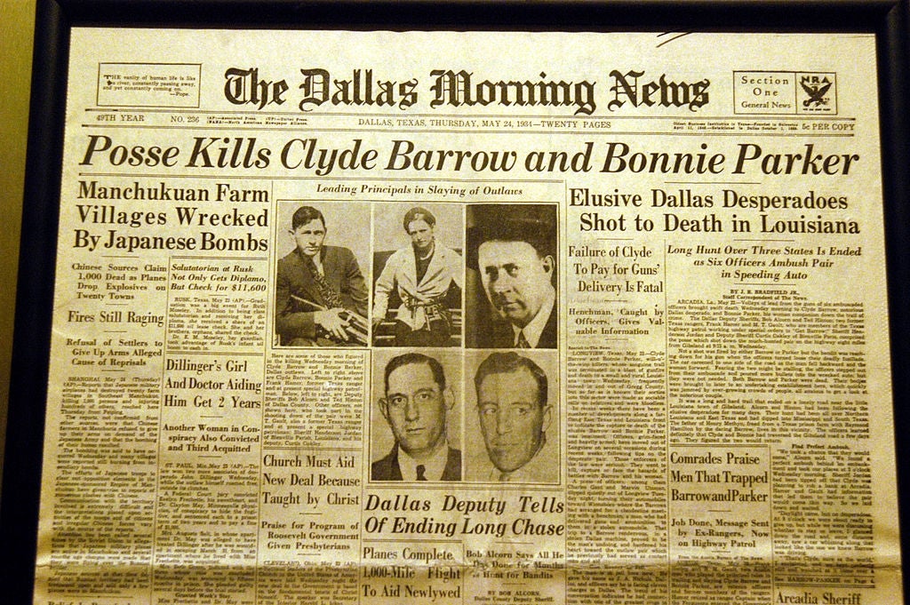 A 1934 newspaper headline reports the killing of Clyde Barrow and Bonnie Parker, infamous outlaws, by law enforcement