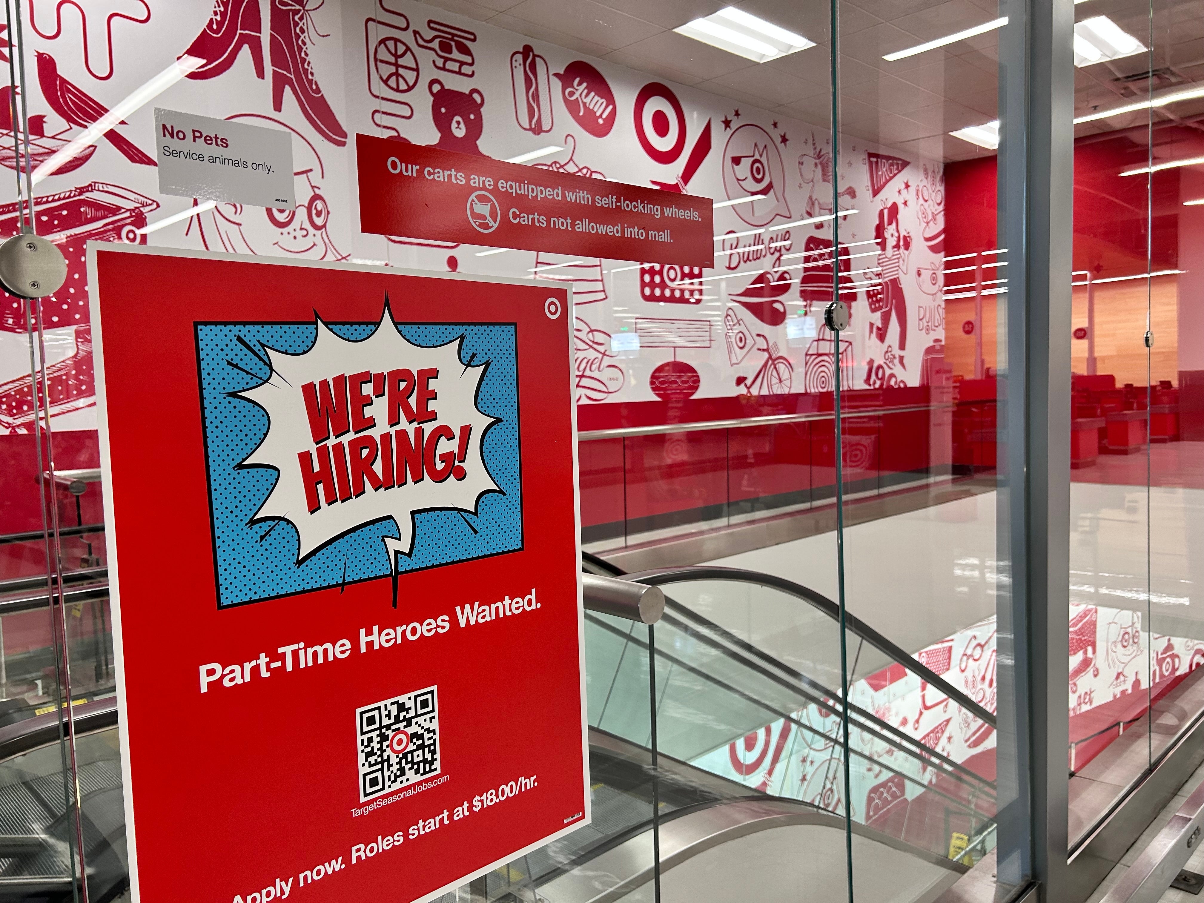 Store interior with a large "We're Hiring!" sign. Part-time positions available with a starting pay of $15.00/hr. QR code for applications