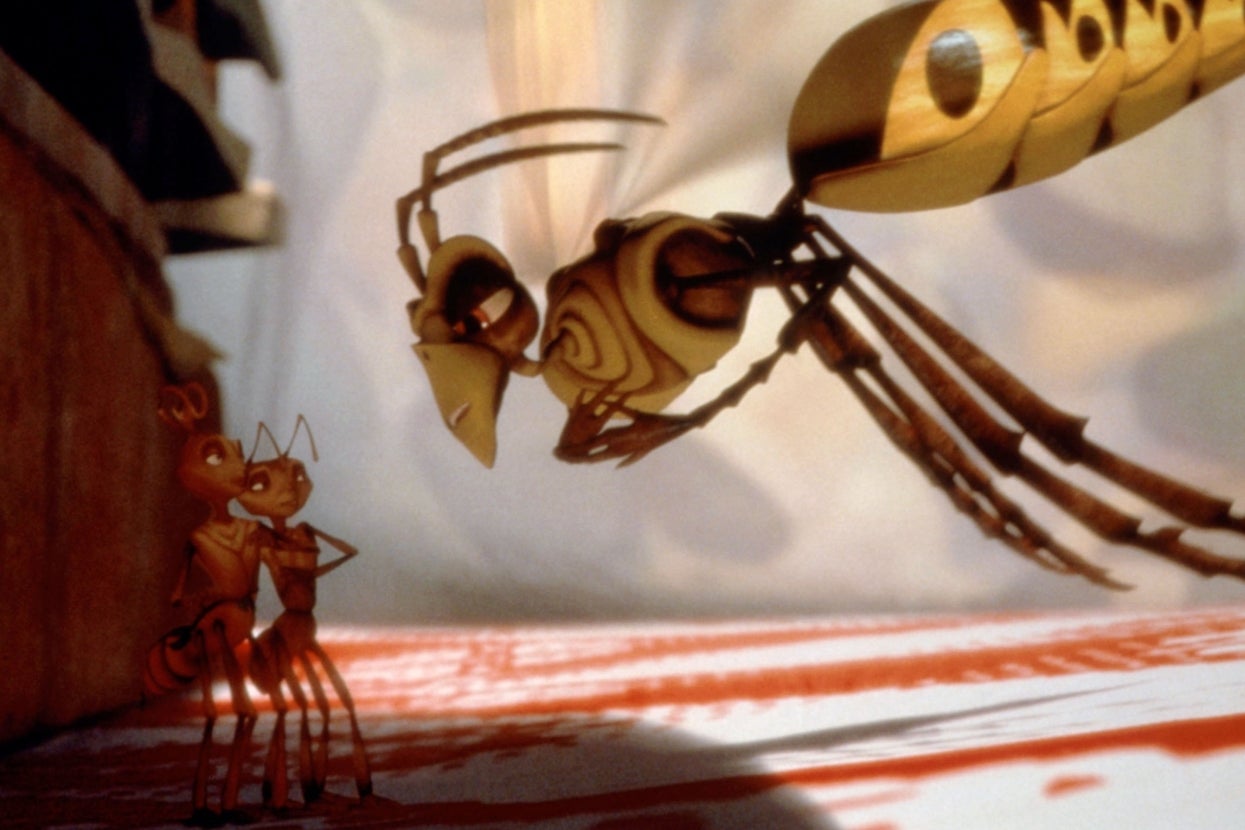 Animated scene with two ants confronted by a large wasp in a tense interaction from film "Antz"