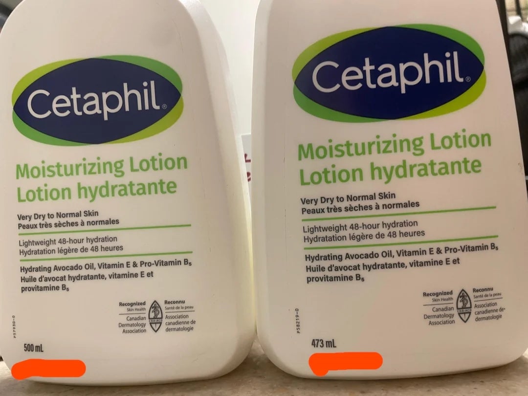 Two bottles of Cetaphil Moisturizing Lotion for precise  adust  to mean   skin, labeled successful  English and French, incorporate  500 ml and 473 ml