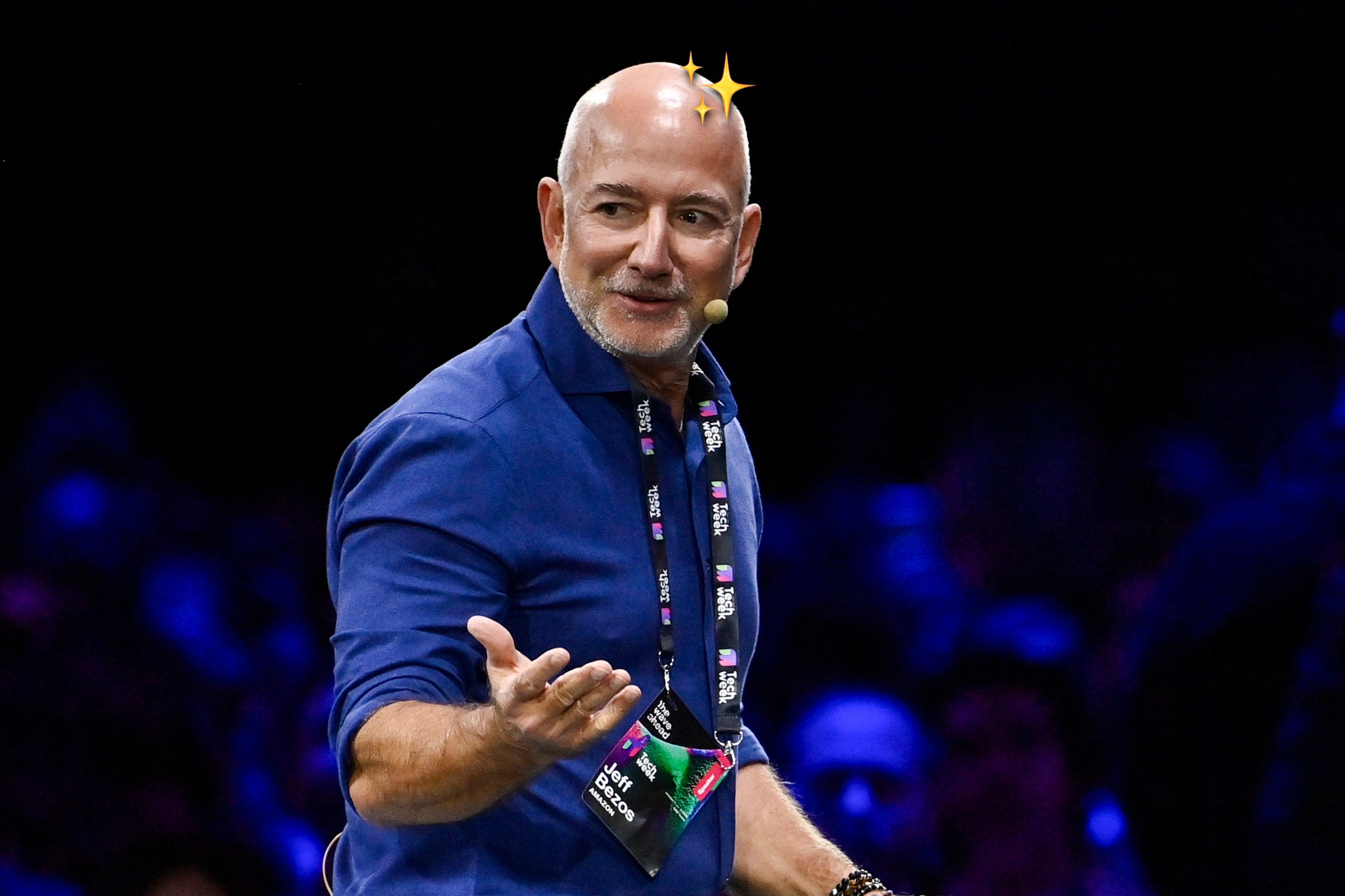 Jeff Bezos speaking at Tech Week with a sparkle emoji on his head