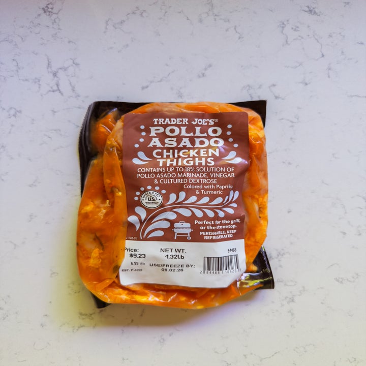 Trader Joe's Pollo Asado Chicken Thighs, marinated in vinegar with paprika and turmeric. Net weight 1.32 lbs, USDA inspected
