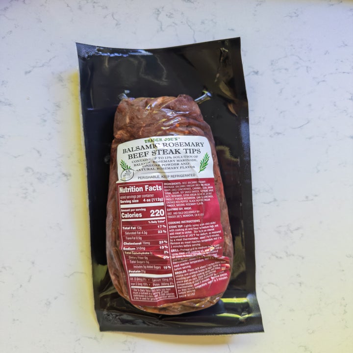 Packaged Trader Joe's Balsamic Rosemary Beef Steak Tips with nutrition label visible