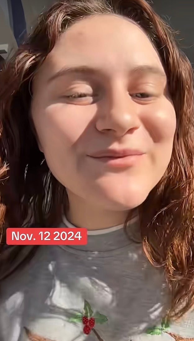 Person smiling outdoors, wearing a sweatshirt with a small design. Text on image reads "Nov. 12, 2024."