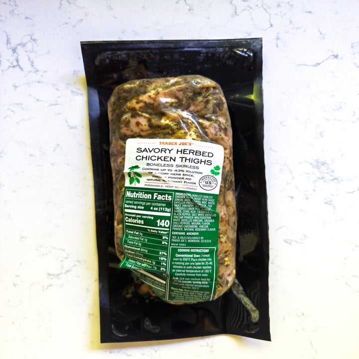 Packaged Trader Joe's savory herbed boneless, skinless chicken thighs with nutrition facts and instructions visible