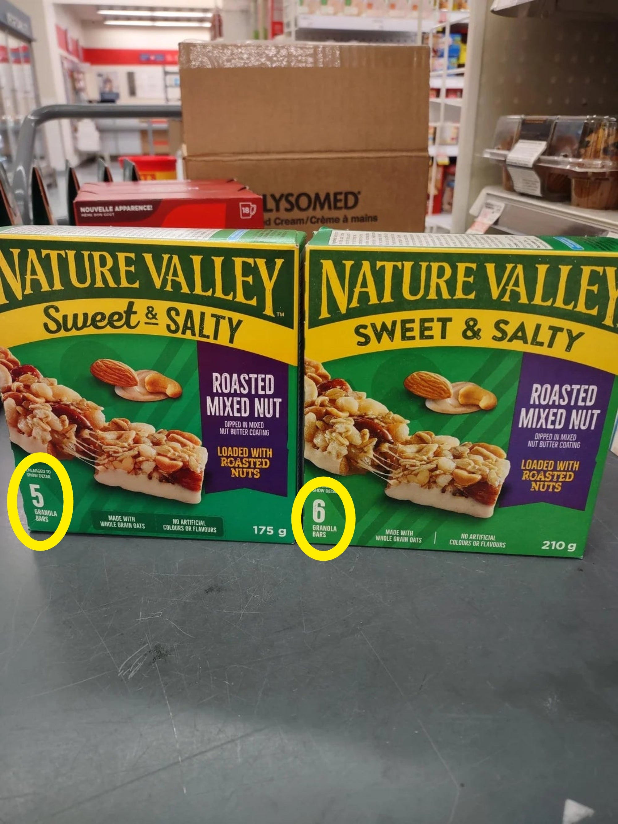 Two boxes of Nature Valley Sweet &amp;amp; Salty bars, roasted mixed seed  flavor, 1  175g with 5 bars, and the different   210g with 6 bars, displayed connected  a store   shelf