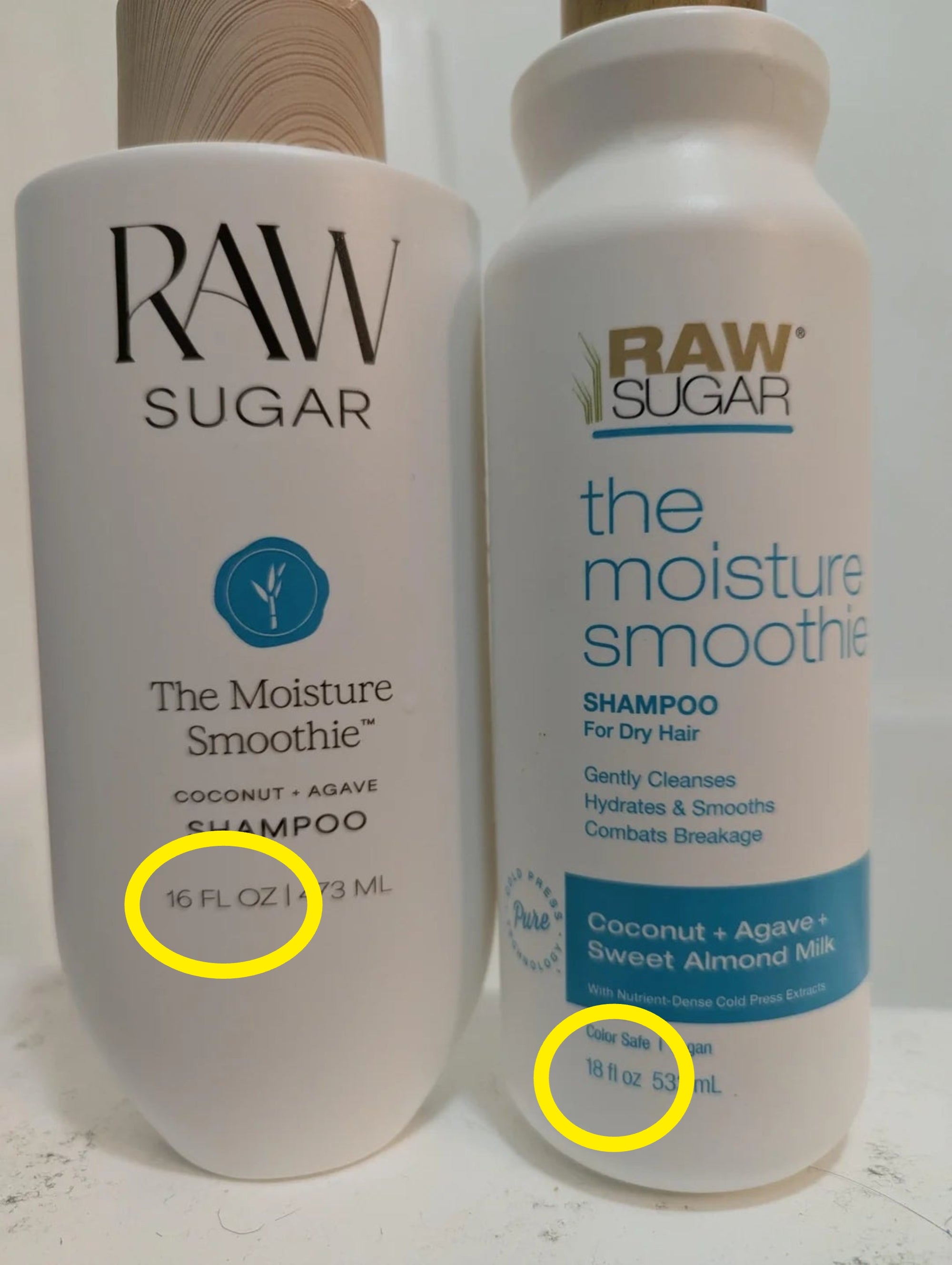 Two bottles of Raw Sugar shampoo labeled "The Moisture Smoothie" with details astir  ingredients and hairsbreadth  benefits