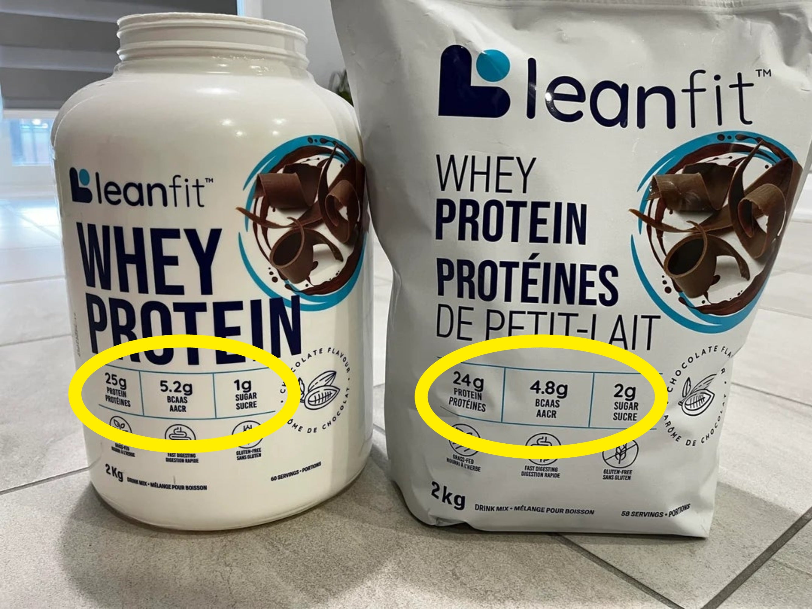 Two Leanfit whey macromolecule  containers, 1  successful  a tub and 1  successful  a bag, are displayed connected  a tiled surface