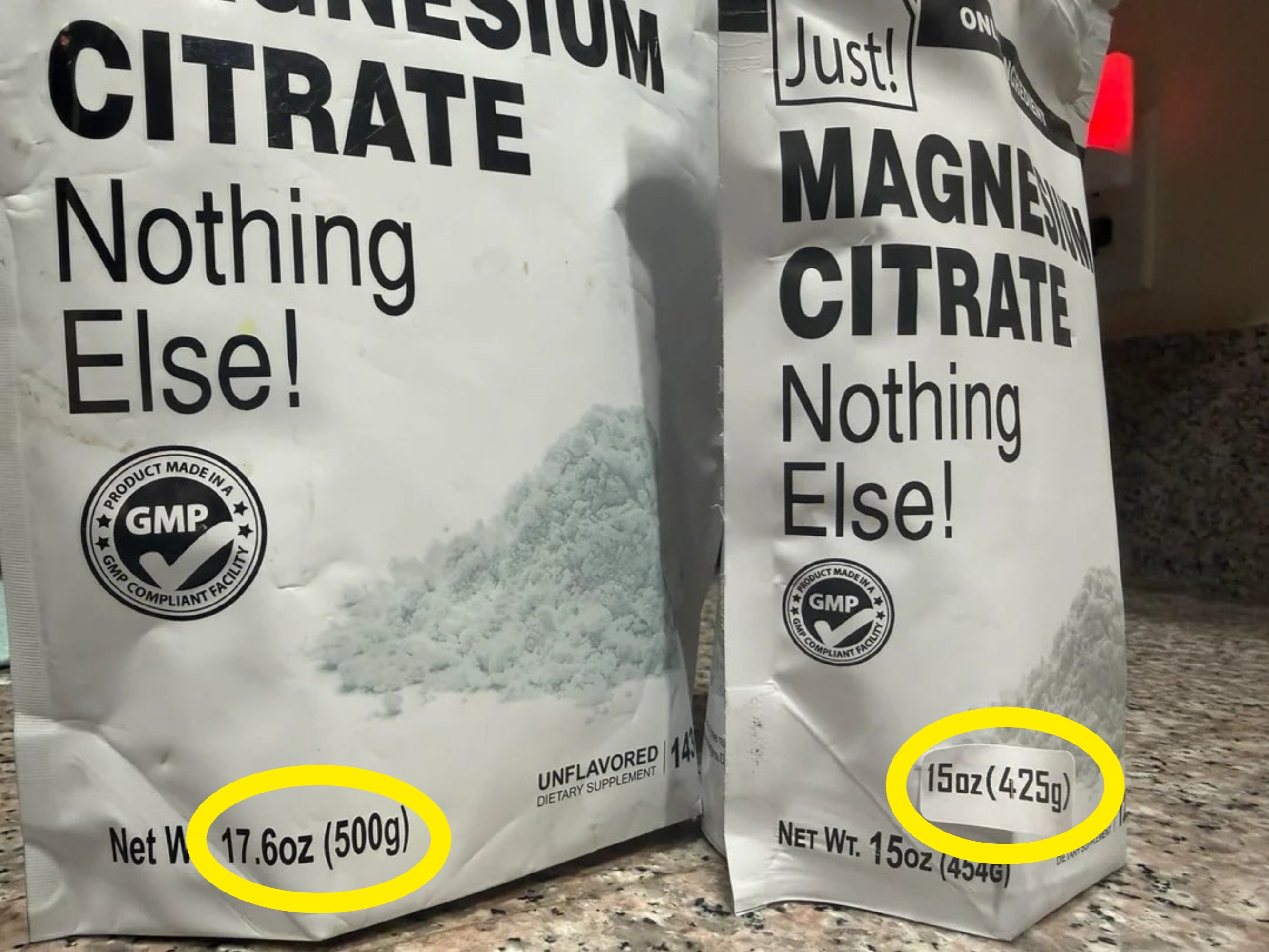 Two bags of magnesium citrate pulverization  labeled "Nothing Else" connected  a room  counter