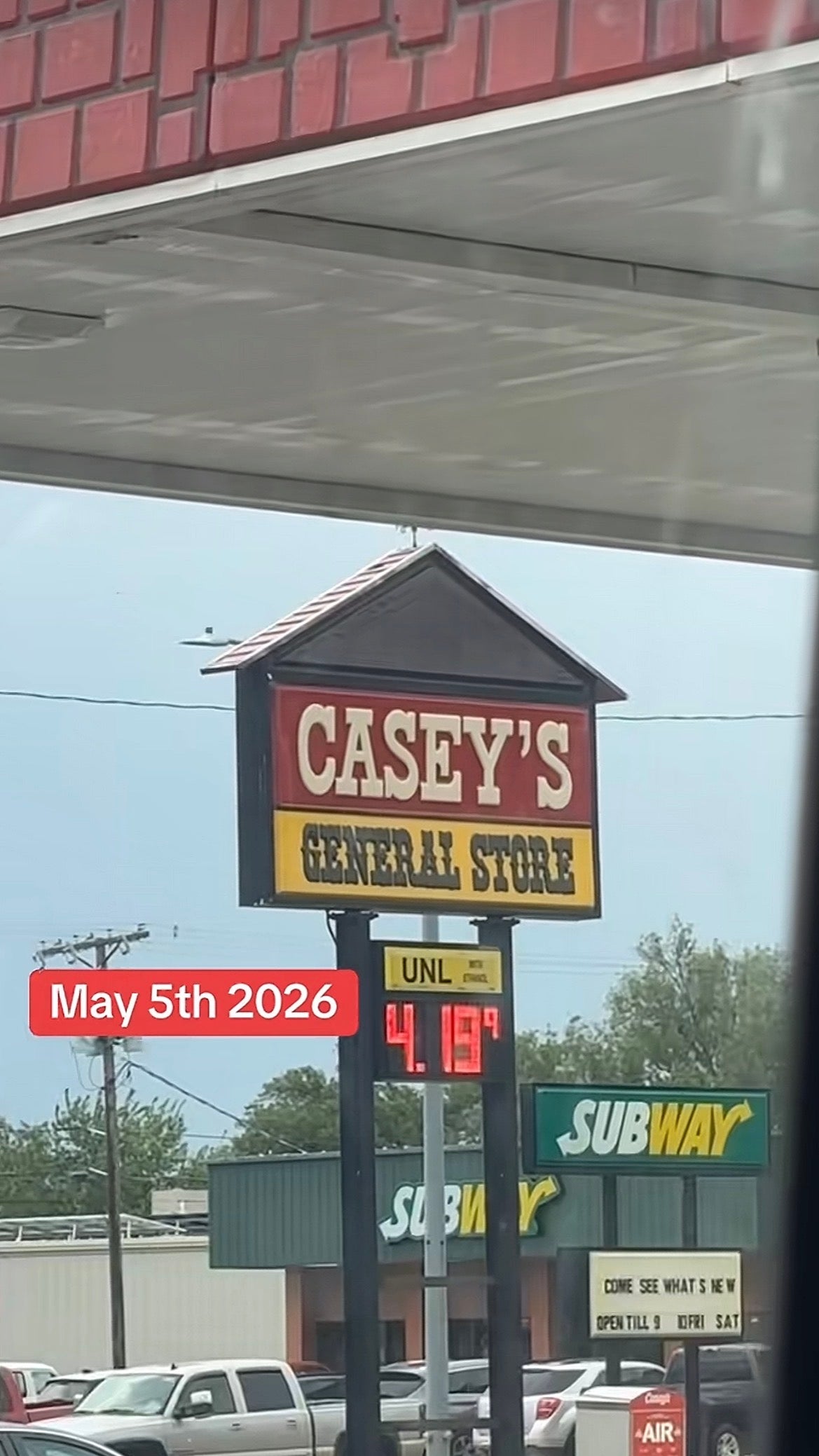 Casey's General Store sign displaying gas price $4.139 per gallon with a Subway in the background, dated May 5th, 2026