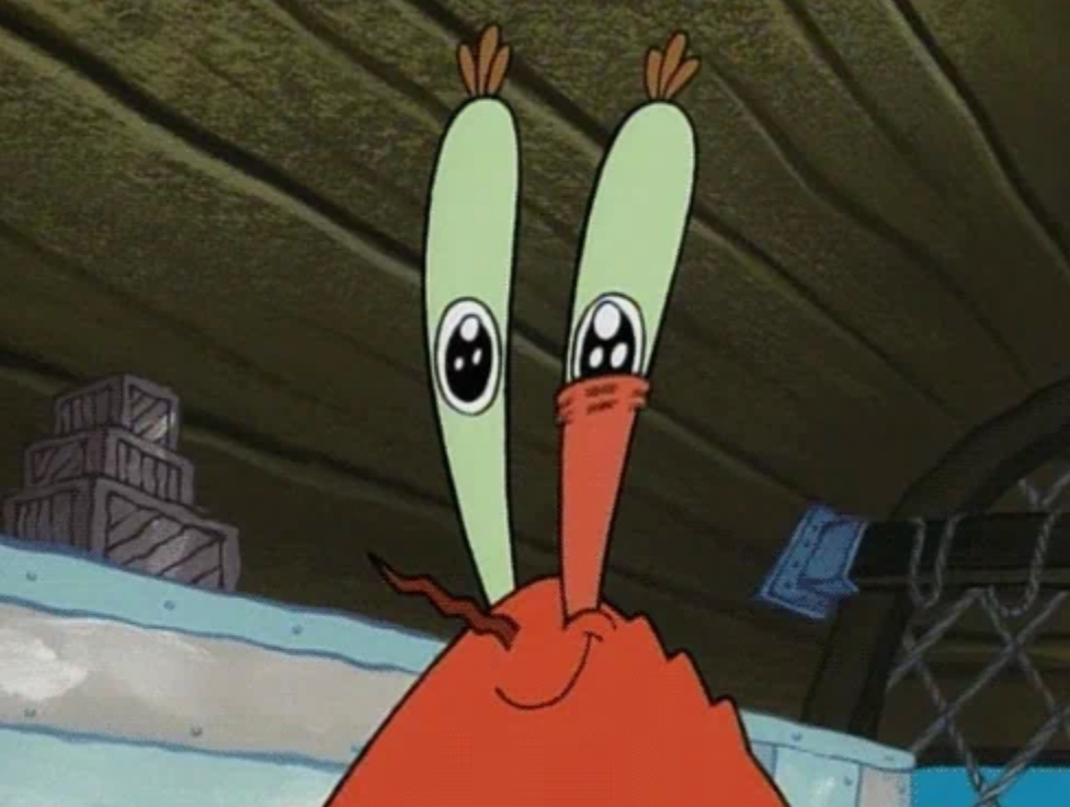 A cartoon crab with large eyes looks ahead, standing inside a wooden structure with crates in the background