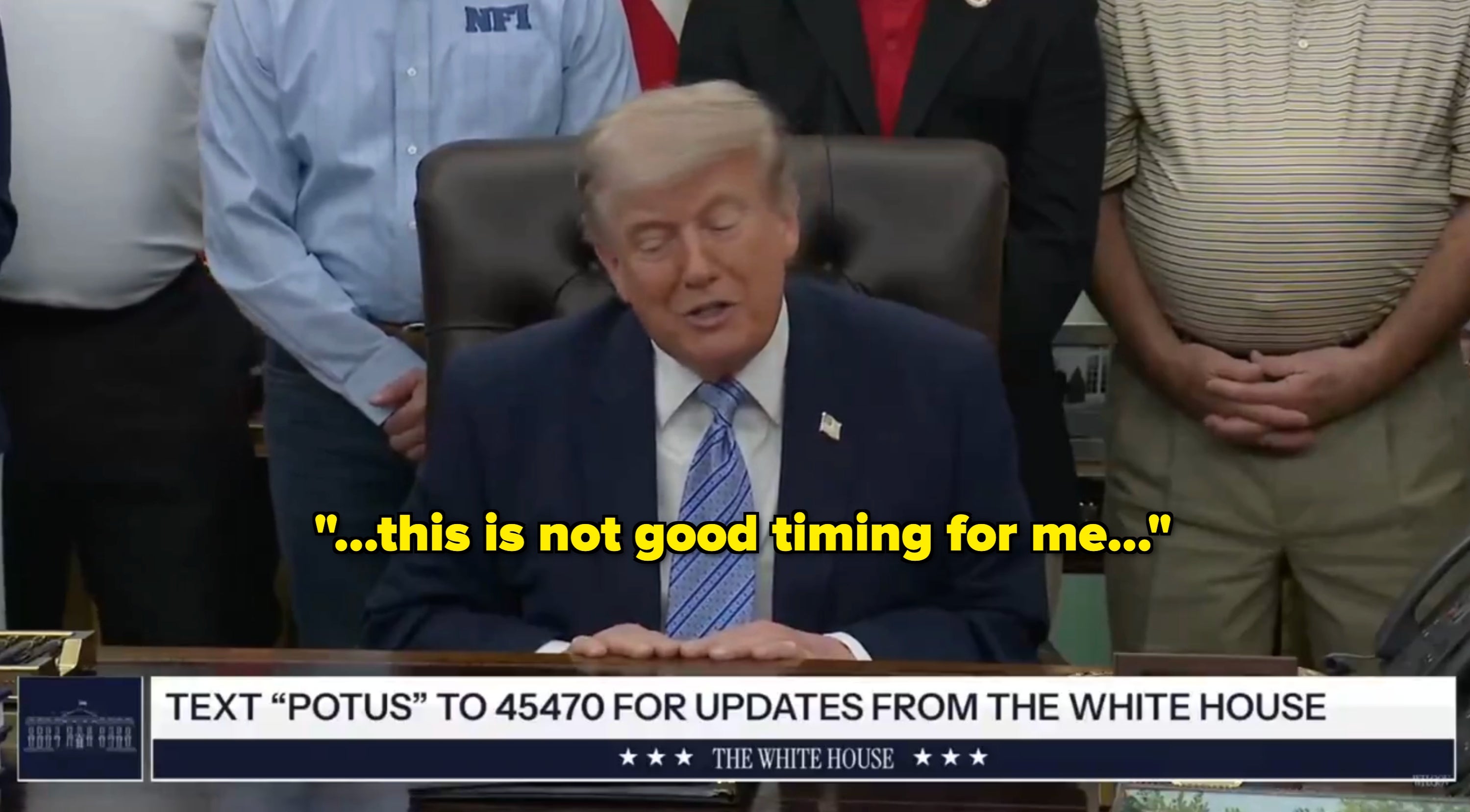 A idiosyncratic   is sitting astatine  a desk, speaking during an authoritative  event. A substance   banner instructs to substance   "POTUS" to 45470 for updates from the White House