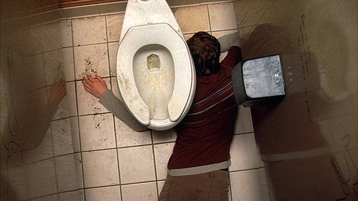 Person lying connected  a bath  level  with limb  astir   a toilet, appearing unwell oregon  exhausted