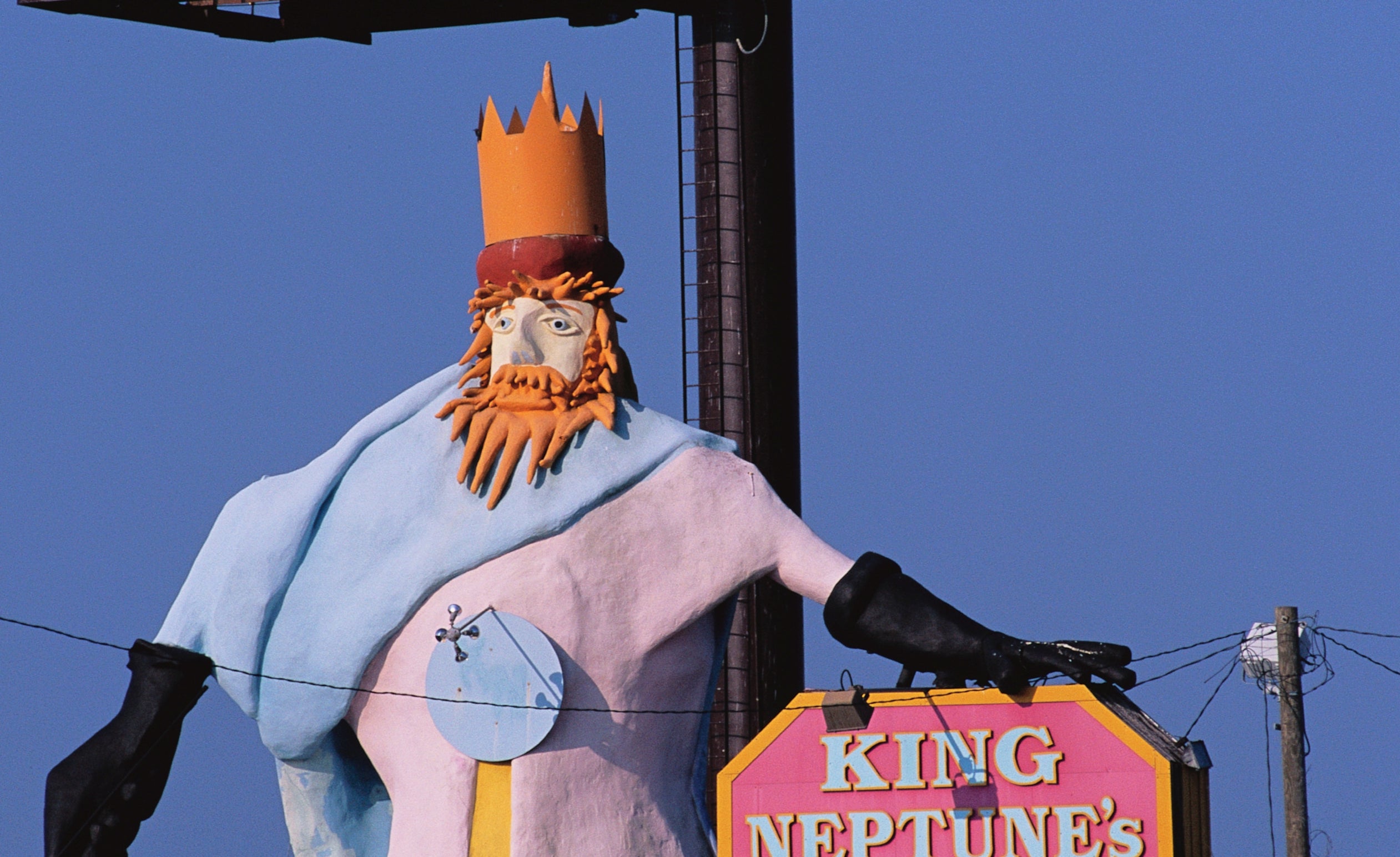 Billboard advertises Wendy's items for 99 cents including a drink and fries, noting "Actual Size (Well Almost)" for the visuals depicted