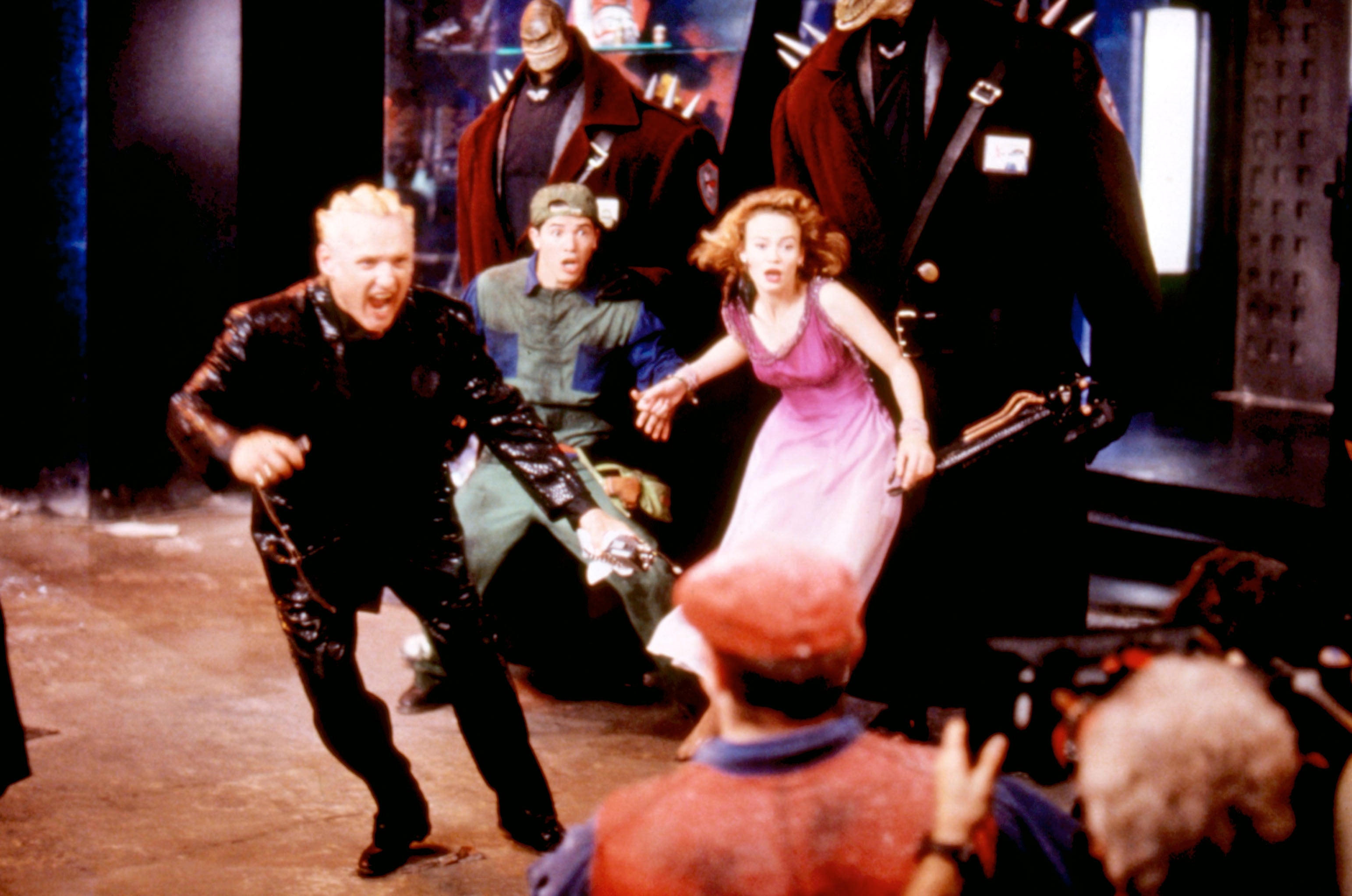 Characters acting successful  a sci-fi movie  scene, with 1  successful  futuristic attire and others successful  dynamic poses, suggesting a tense oregon  action-packed moment