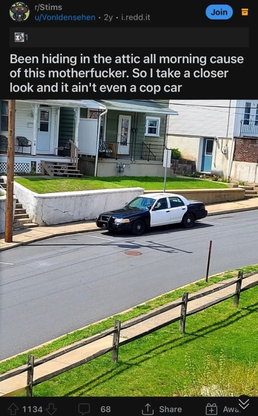 View of a car parked near houses; user humorously describes hiding from it, mistaking it for a police car
