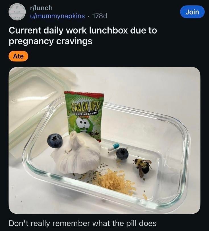 Glass container with garlic, blueberries, candy, rice, and a pill, labeled "Current daily work lunchbox due to pregnancy cravings."