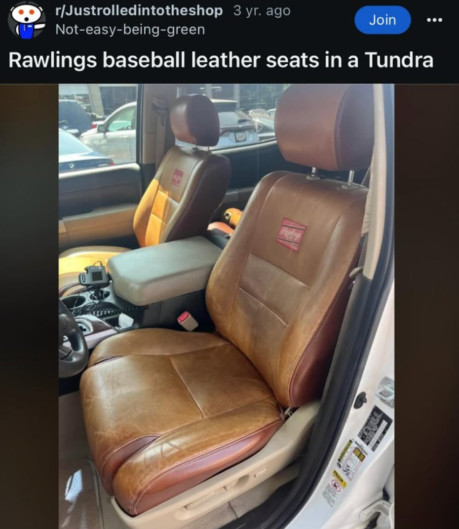 Car interior with leather seats designed to resemble Rawlings baseball gloves in a Toyota Tundra