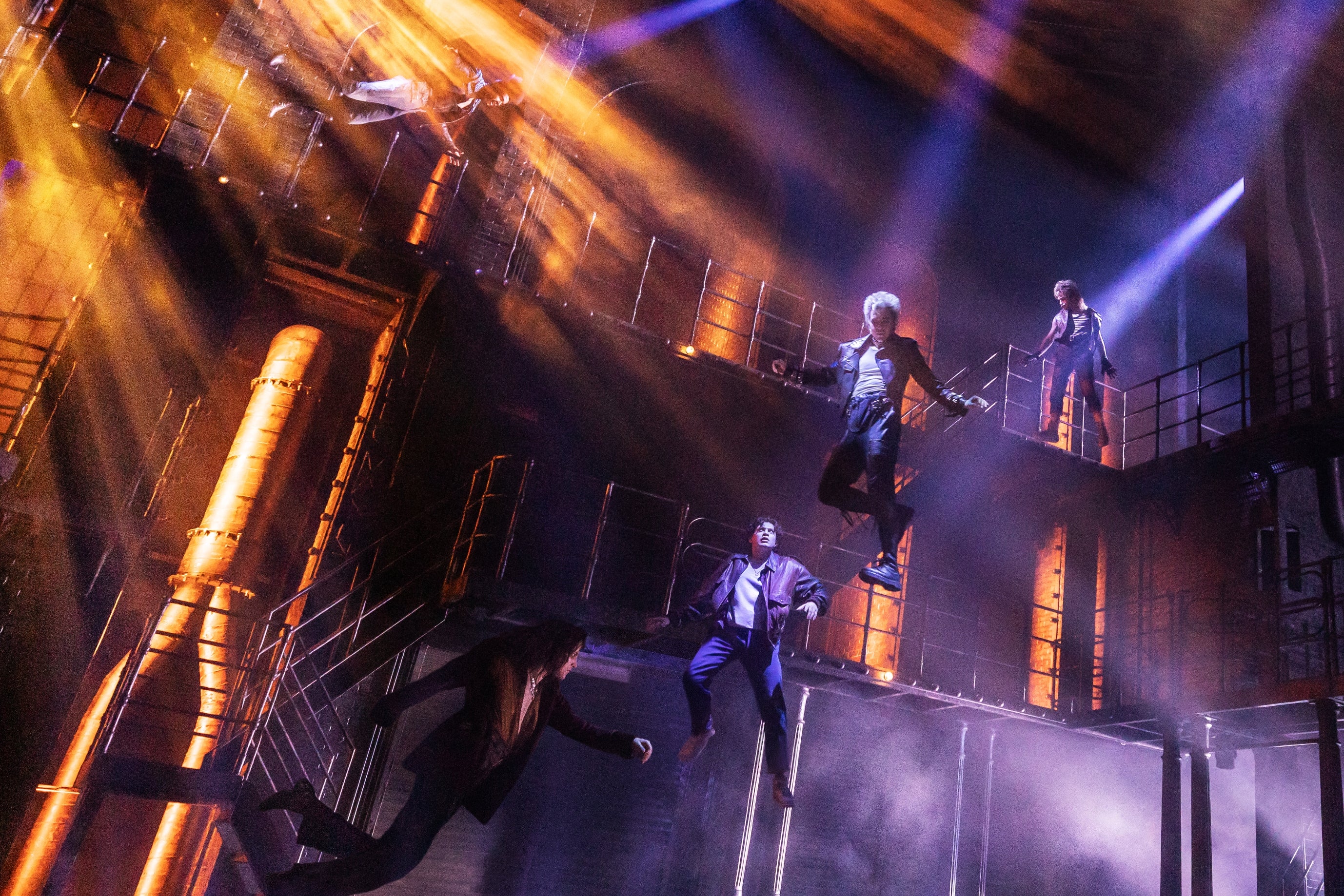 Performers connected a signifier with melodramatic lighting, engaging successful a dynamic and theatrical euphony show with an concern acceptable design