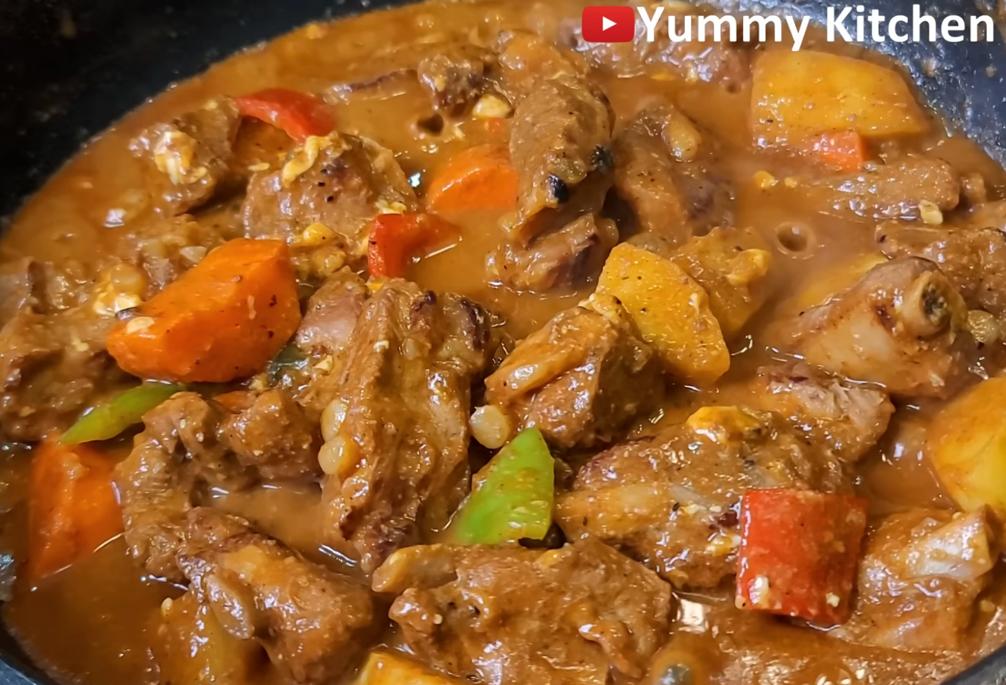 A hearty crockery of braised nutrient with chunks of vegetables successful a affluent sauce, featured successful "Yummy Kitchen."