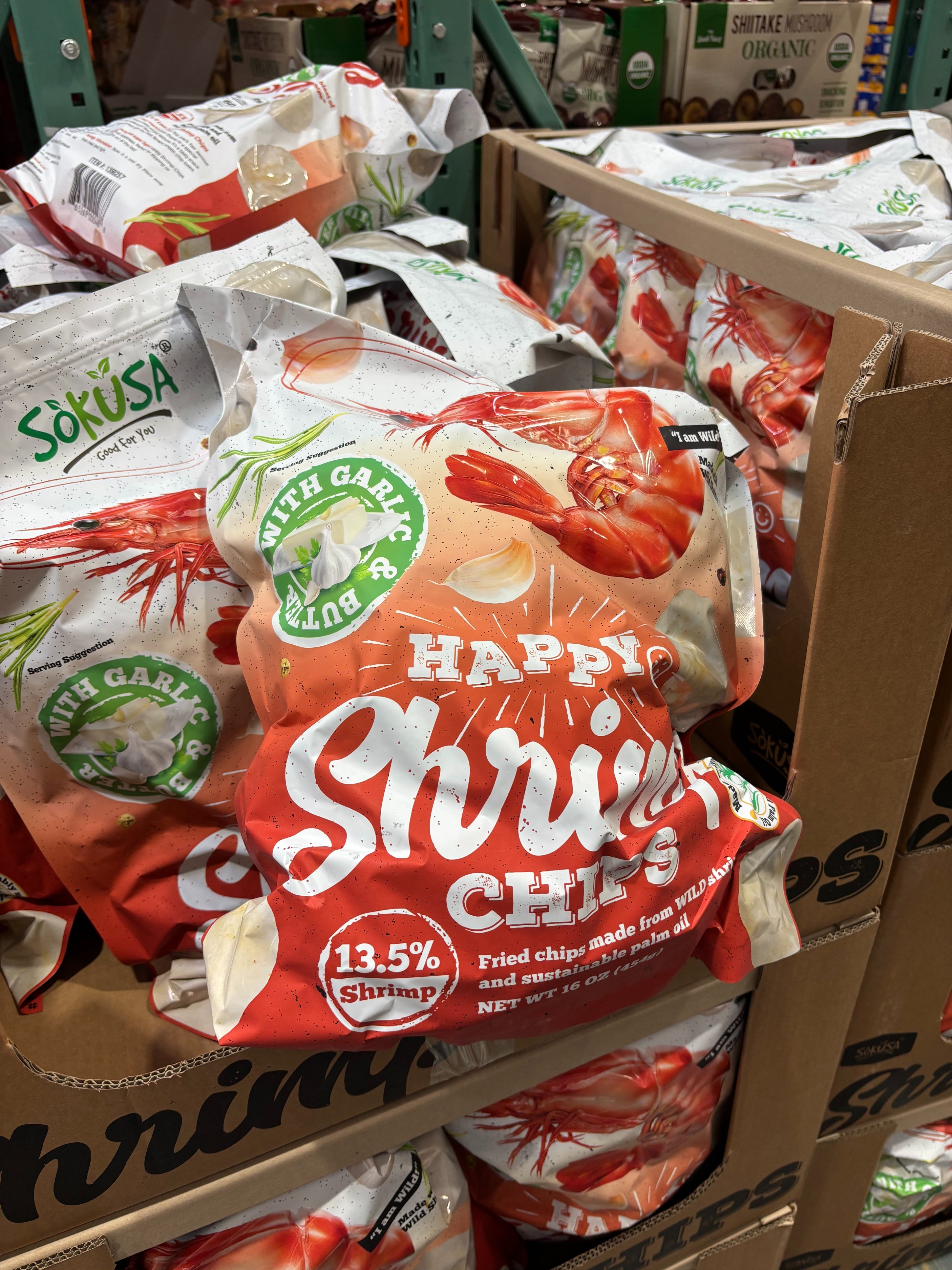 Bags of chips on display in supermarket