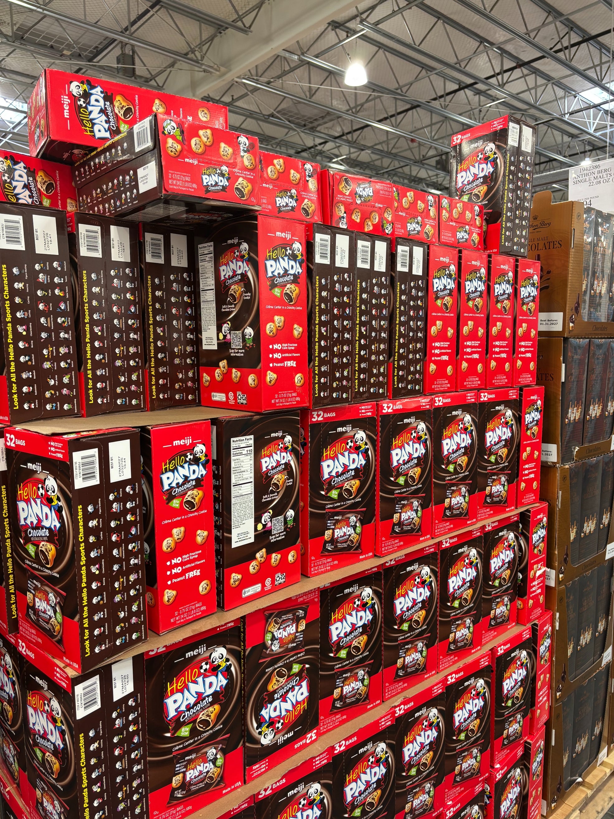 Boxes of Hello Panda snacks stacked in a warehouse