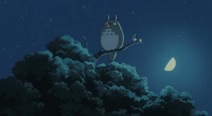 Two owl-like creatures beryllium   connected  a subdivision  astatine  nighttime  nether  a crescent moon, surrounded by treetops