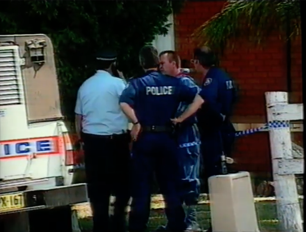 Police officers stitchery  adjacent   a constabulary  conveyance  with transgression  country   portion    disposable   successful  an outdoor area
