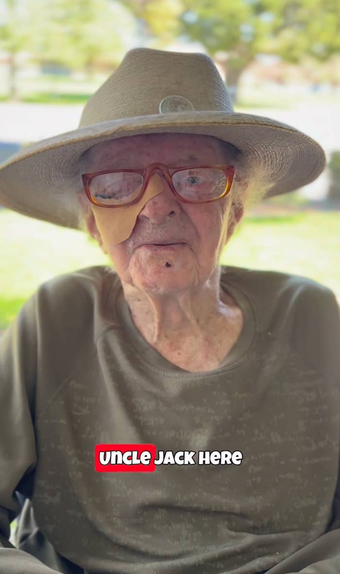 Elderly idiosyncratic   wearing glasses and a wide-brimmed hat, with substance   connected  the representation  saying "Uncle Jack Here."
