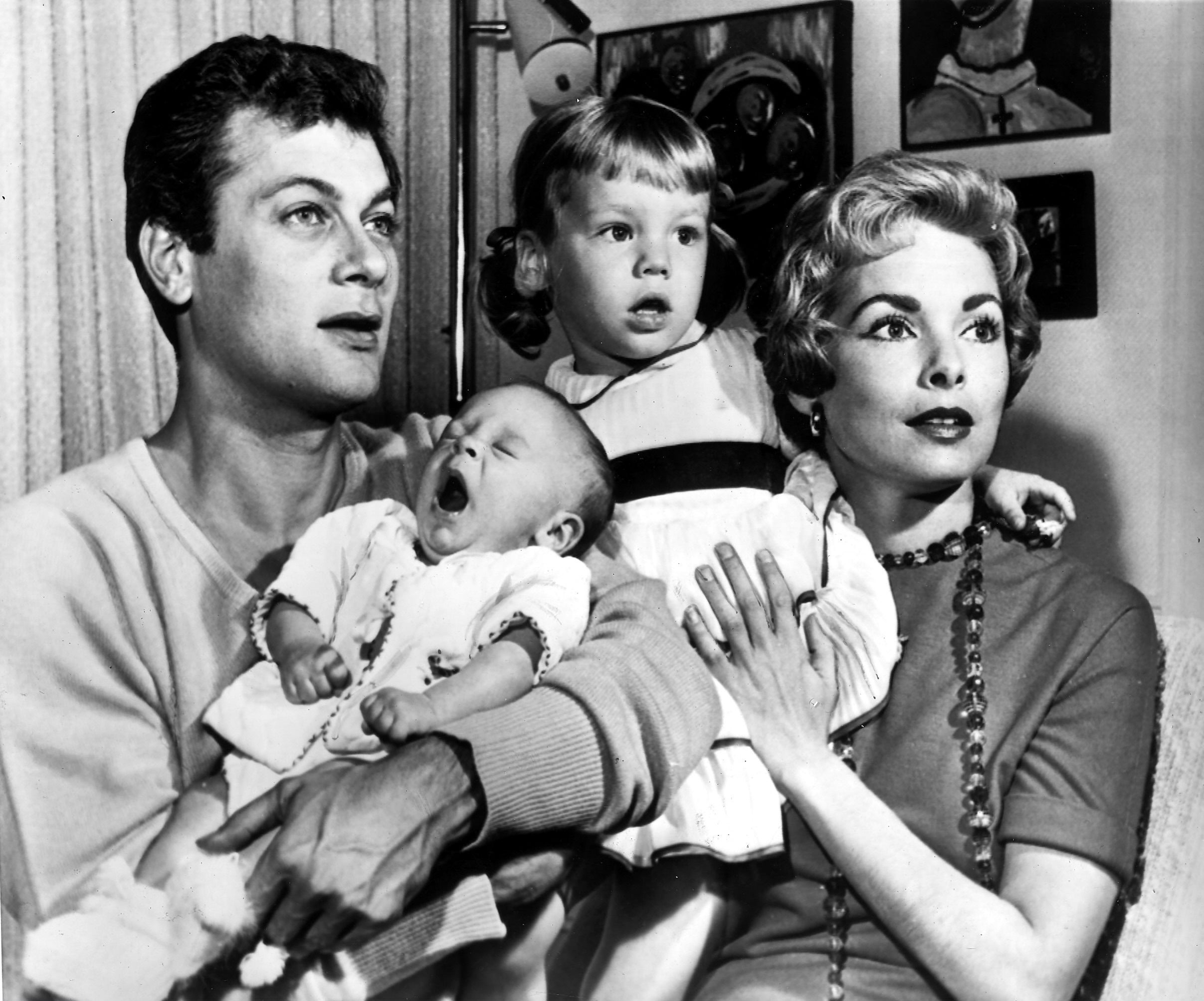 Tony Curtis and Janet Leigh airs with their young daughters