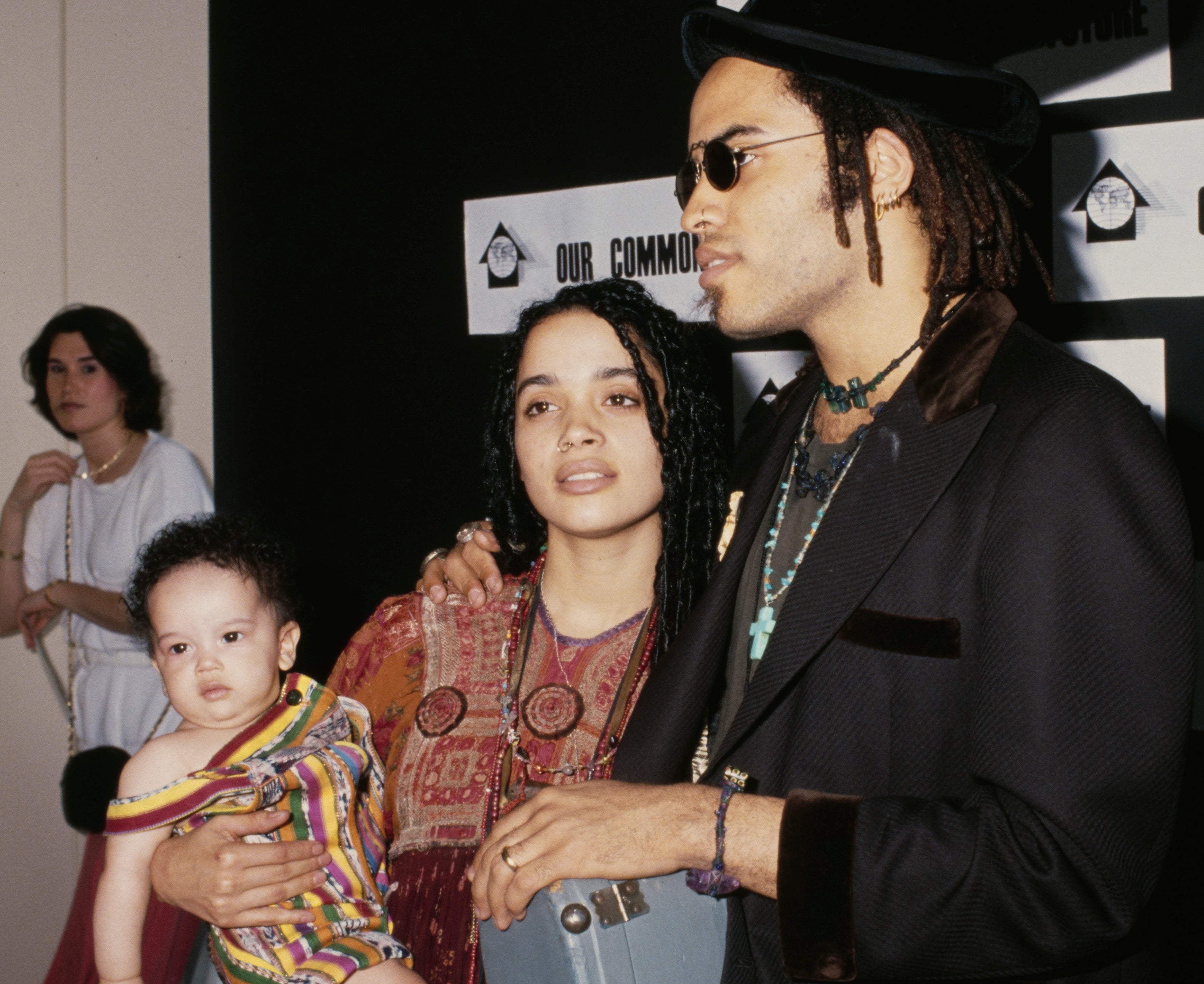 Lisa and Lenny basal with a babe Zoe astatine an event.