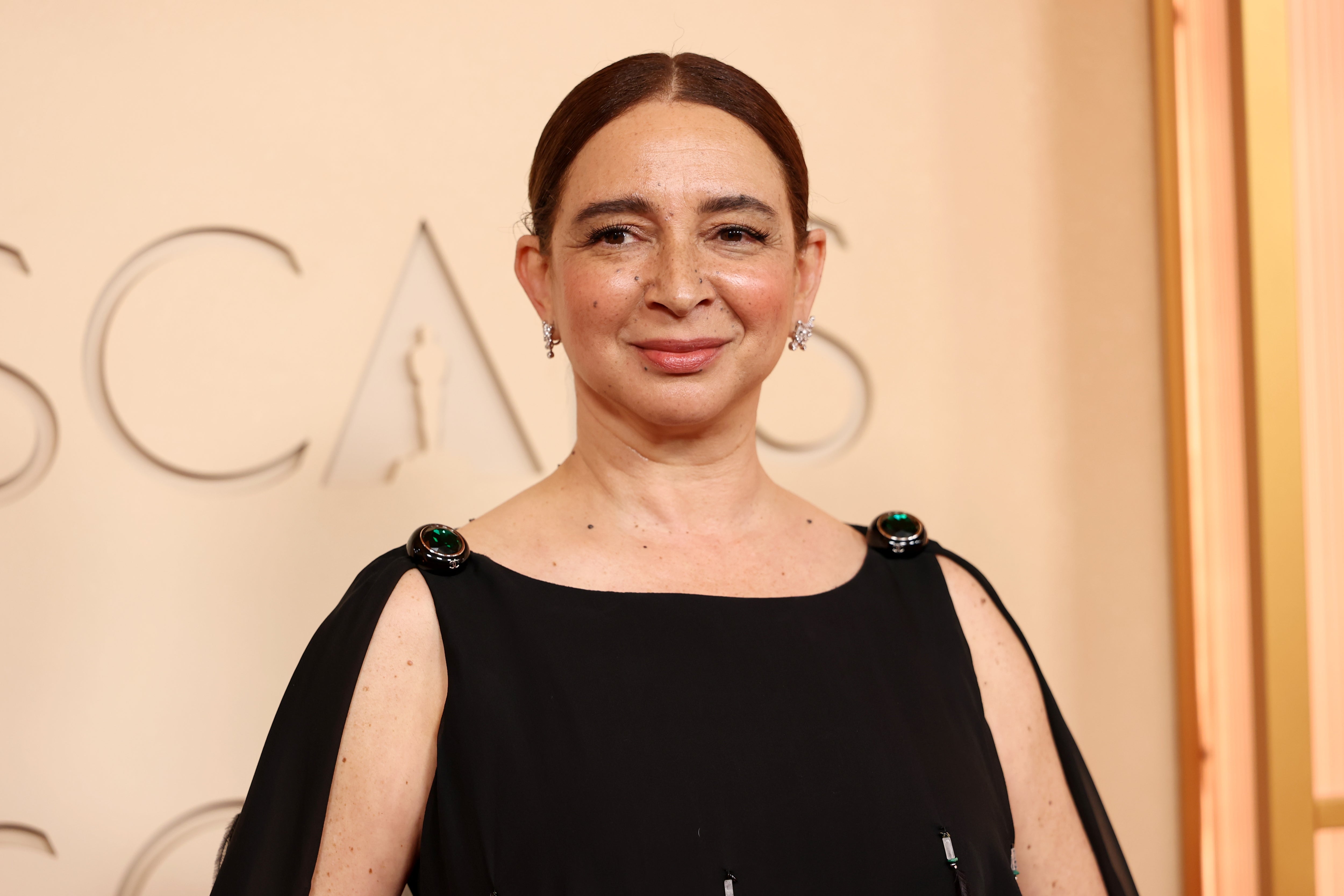 Maya Rudolph successful elegant achromatic formal with decorative enarthrosis embellishments