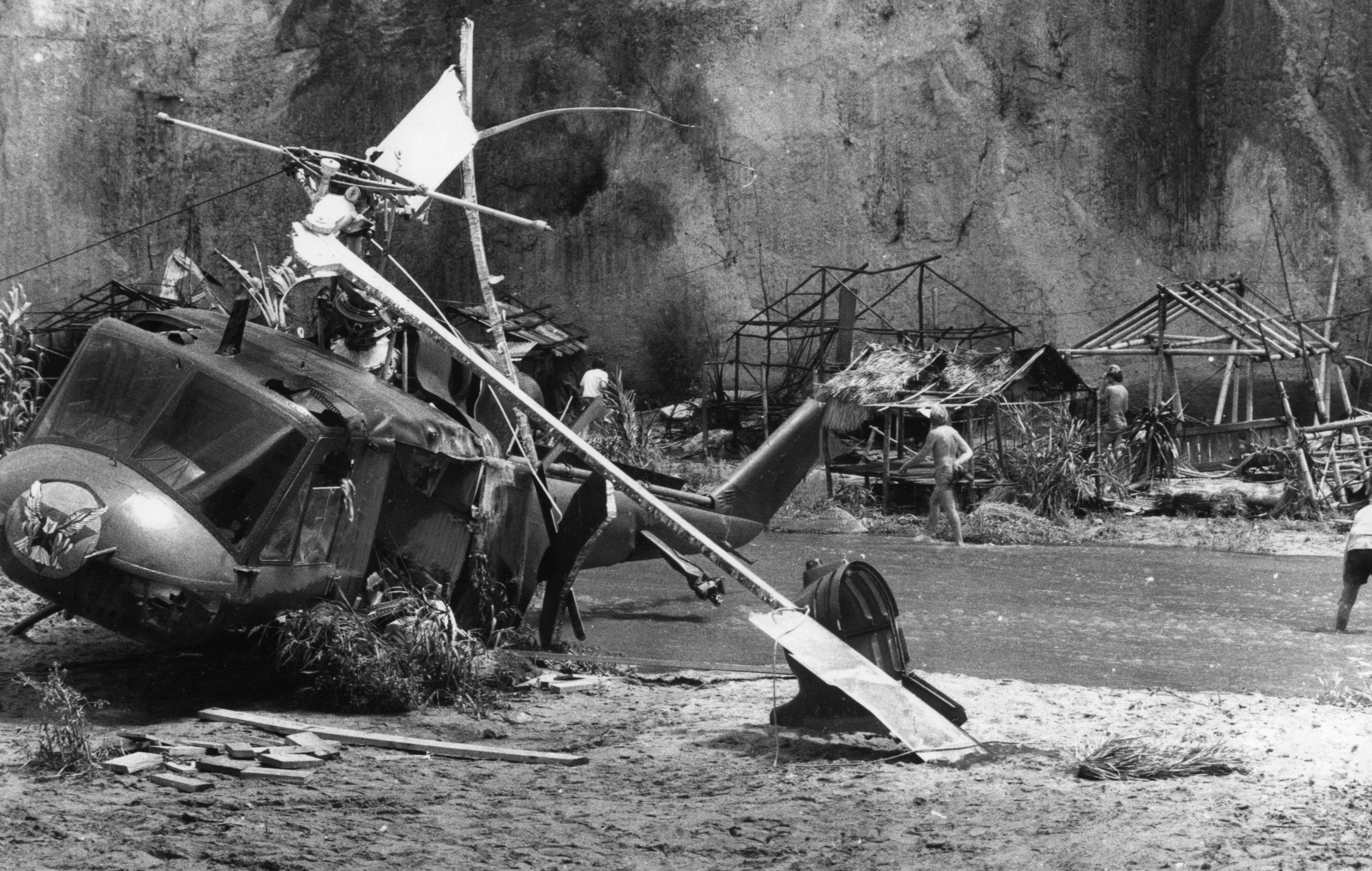 Helicopter clang country connected a formation with radical nearby, perchance portion of a movie acceptable oregon catastrophe area, showing damaged structures successful the background