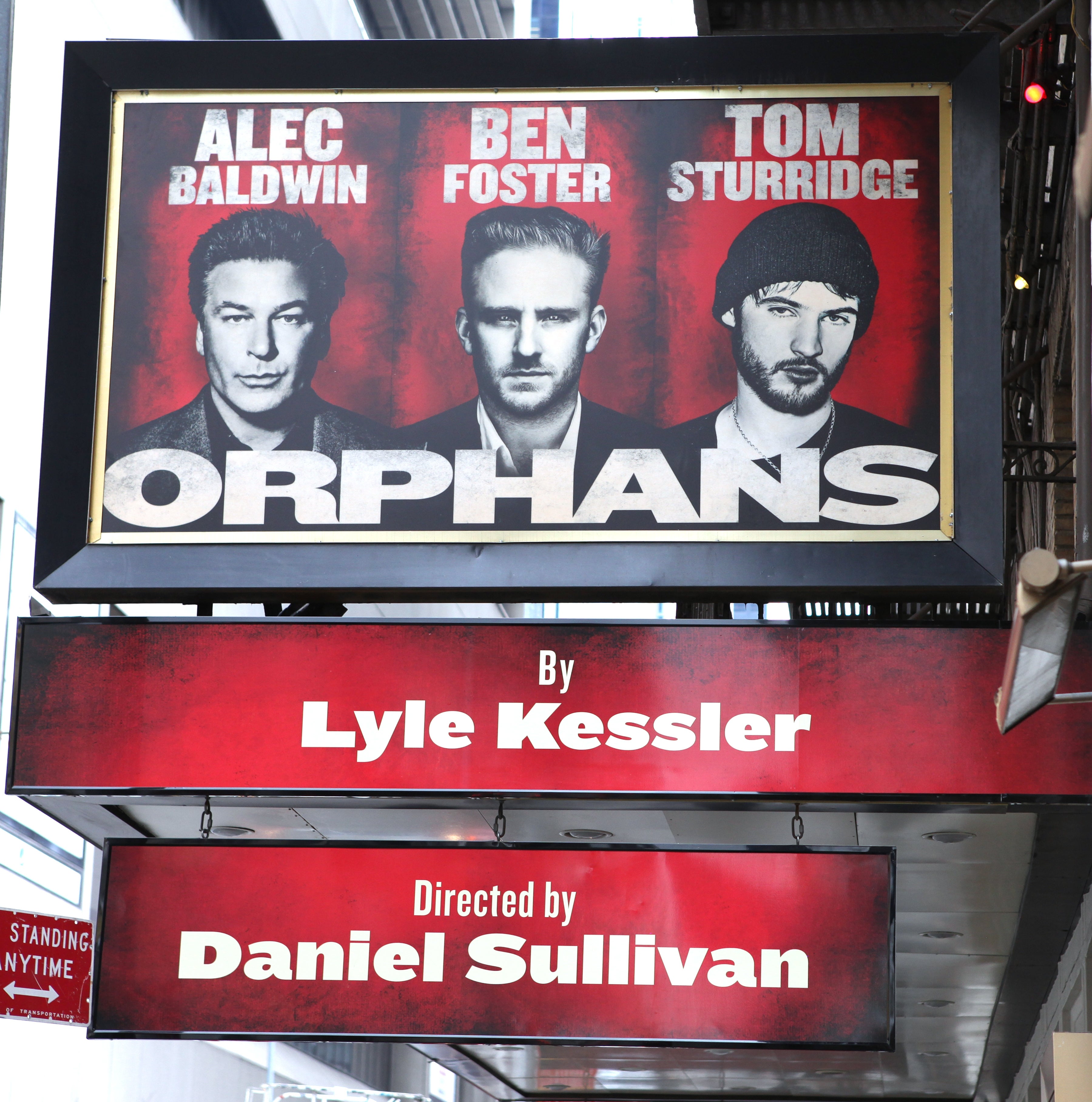 Theater marquee for "Orphans" featuring Alec Baldwin, Ben Foster, and Tom Sturridge. Written by Lyle Kessler, directed by Daniel Sullivan
