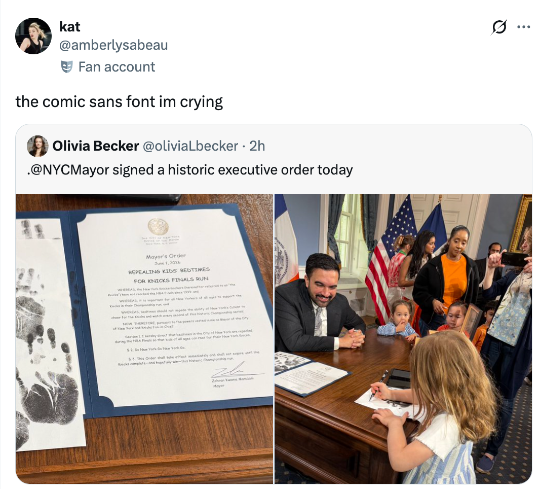 Tweet showing a papers  signed by NYC Mayor with Comic Sans font, alongside an representation  of the Mayor with children astatine  the signing event