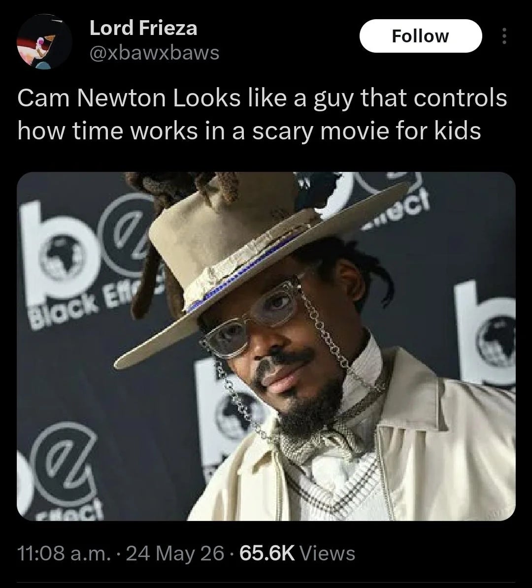 Cam Newton successful  a stylish, avant-garde outfit with a wide-brimmed hat, glasses, and unsocial   hairsbreadth  style. Caption humorously compares his look   to a movie   character