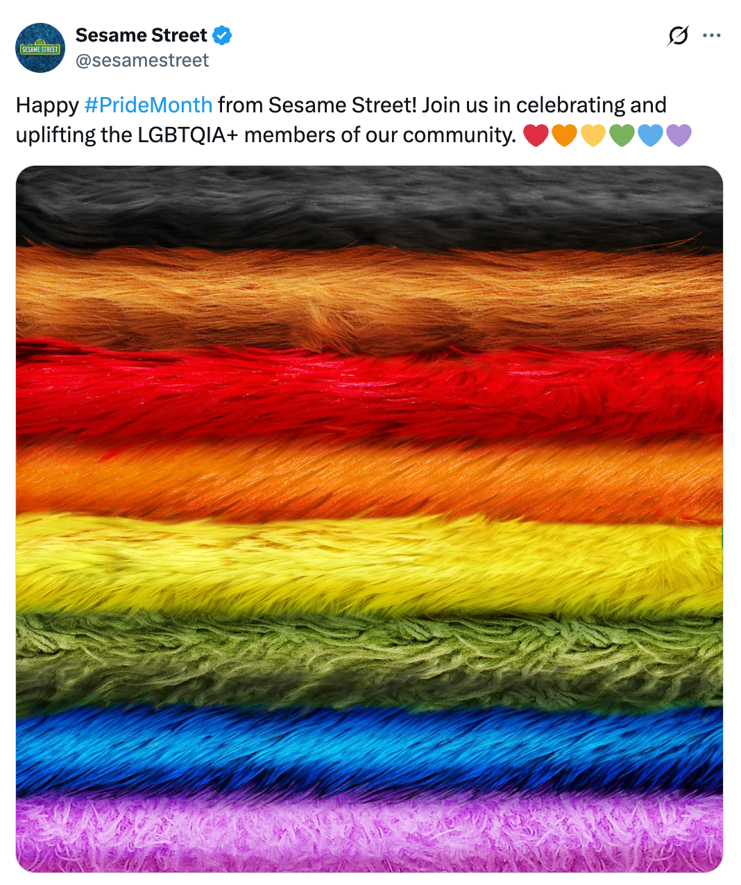 Sesame Street tweet with fuzzy rainbow-colored stripes, celebrating Pride Month and supporting the LGBTQIA+ community