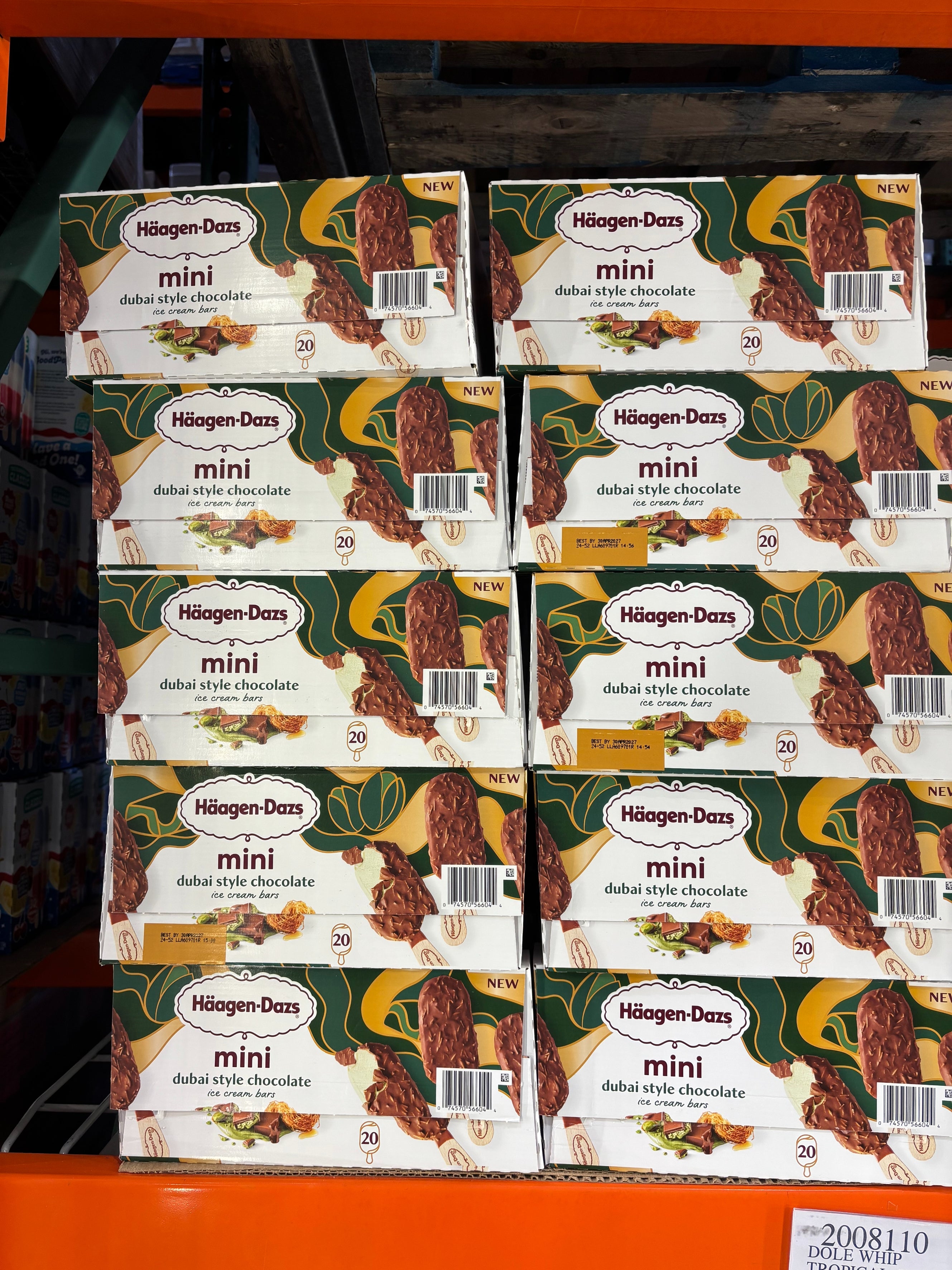 Boxes of Häagen-Dazs mini ice cream bars with chocolate visible in a store display