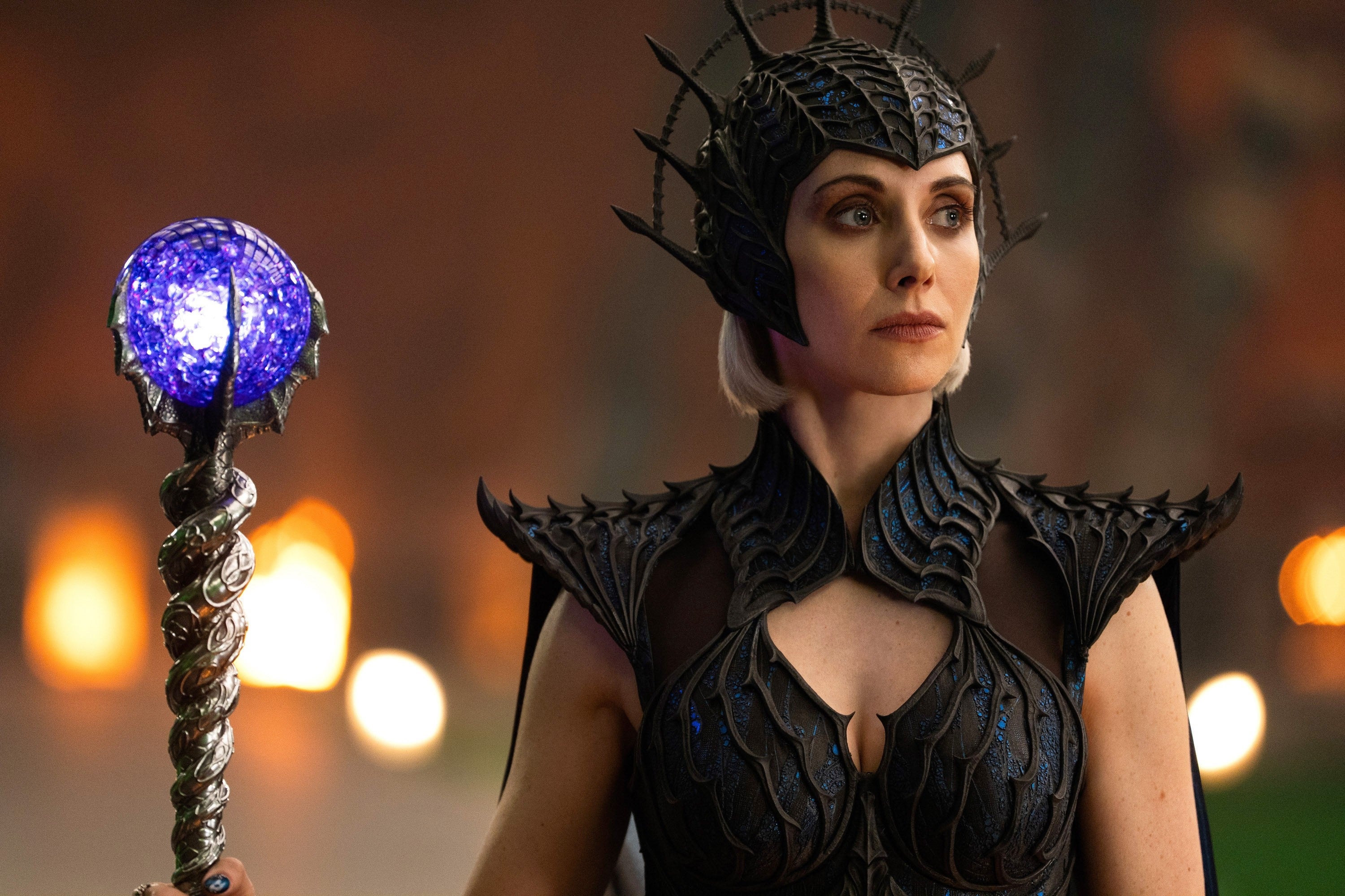 Person successful  elaborate  phantasy  armor holding a glowing staff, appearing regal and intense, apt  successful  a movie   oregon  TV relation   acceptable   successful  a fictional universe
