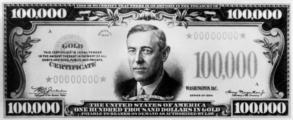 U.S. $100,000 bill from 1934 featuring Woodrow Wilson's portrait, used for transactions between Federal Reserve Banks. Not for public circulation