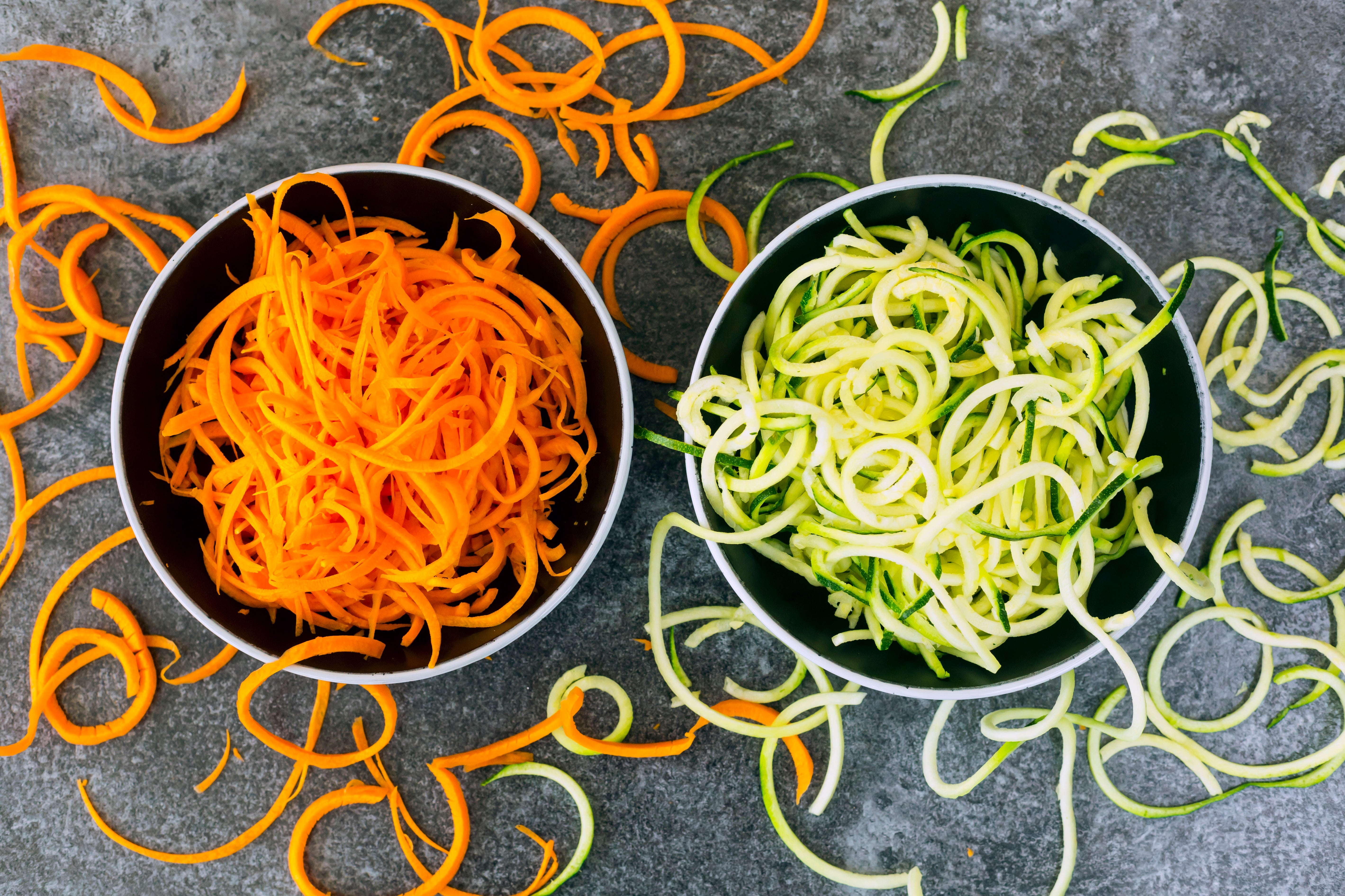 Bowls of carrots and zucchini successful  bowls