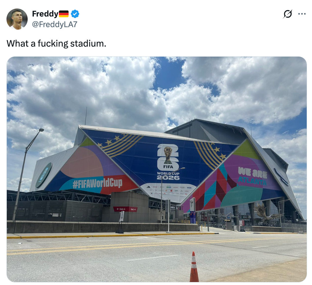 FIFA World Cup 2026 stadium with vibrant banners and a motion that reads "We Are Atlanta."