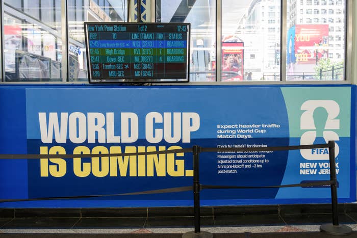 Sign astatine  Penn Station announces the World Cup is coming, warns of accrued  bid     traffic, and advises riders to program  question   accordingly